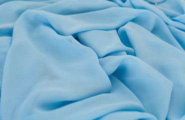 Color blue textil, silk fabric with pleats