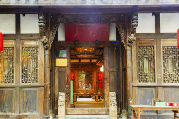 Fototapeta na wymiar Wooden door of Chinese folk house