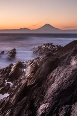 Japan seascape and Mt. Fuji in sunset. Seen from Jogashima island , Kanagawa prefecture. Jogashima is a small island off the south coast of Miura peninsula.