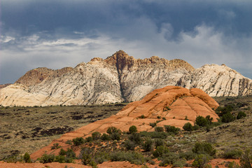 Amazing stormy view of the different sandstone colors in Snow Canyon State Park in Southern Utah.