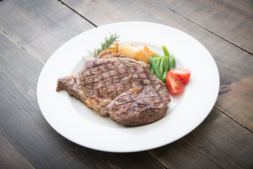 boneless rib eye steak on plate