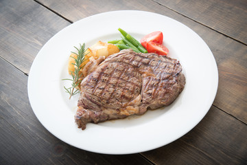 boneless rib eye steak on plate