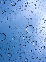 Abstract of droplets against a blue background