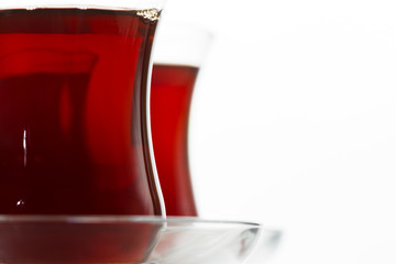 Turkish tea in traditional glass isolated on white background