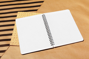 Notebook open page design on table