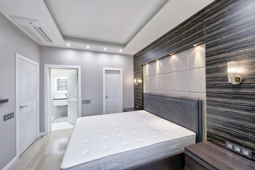 Modern interior of a bedroom in the new house.