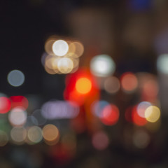 Night bokeh from light on the Road. Street light bokeh. Lights blurred bokeh background from christmas night party for your design.