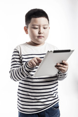 boy(kid) hand hold a tablet pc isolated on the white background.