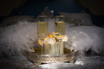 Two glasses of champagne. Romantic room arrangement for a date