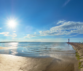 Obraz premium Panoramic image of a seaside by lighthouse in Swinoujscie, Poland