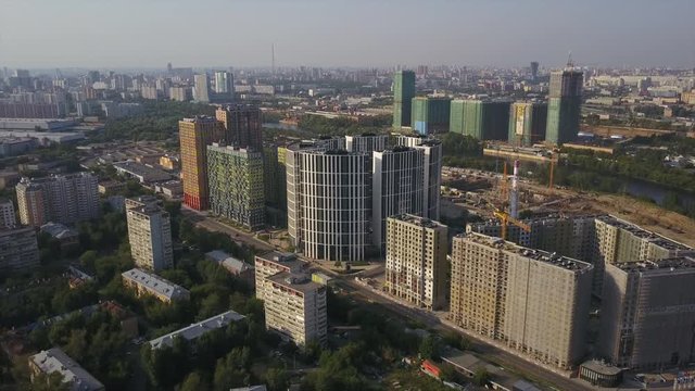 sunset time moscow city modern apartment buildings complex aerial panorama 4k russia
