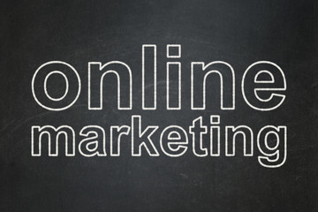 Fototapeta premium Advertising concept: text Online Marketing on Black chalkboard background