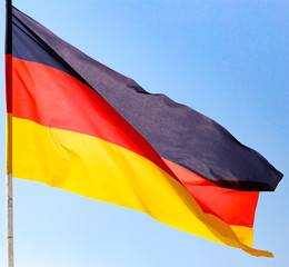Flag of Germany against the blue sky