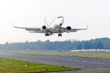 Passenger airplane take off runway airport.