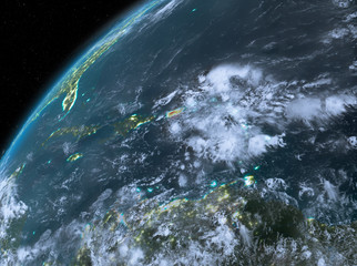 Fototapeta premium Puerto Rico on planet Earth in space at night