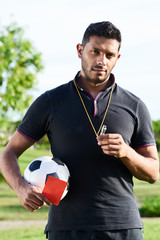 Mixed Race Soccer Referee