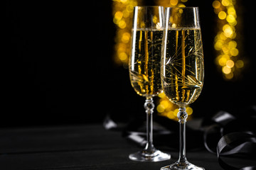 Two champagne glasses in a celebration party set.