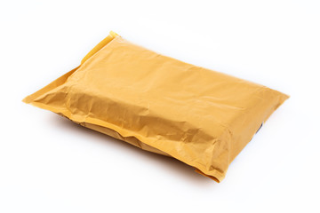 Small paper post packet isolated on the white background