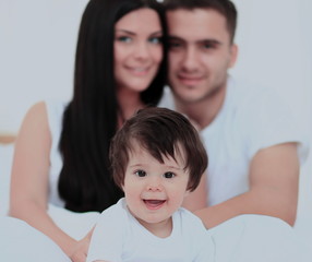 family with young children to bed in the bedroom