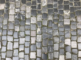 Cobblestone road as a pattern background