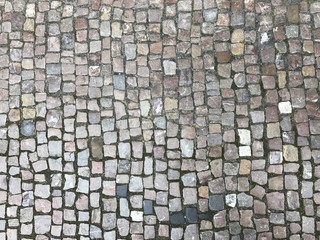 Cobblestone road as a pattern background