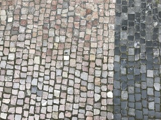 Cobblestone road as a pattern background