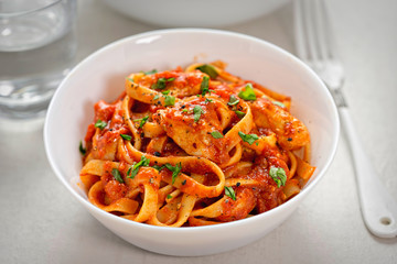 Chicken tagliatelle in tomato sauce 