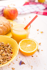 Healthy Breakfast. Various Assortment Set. Orange Juice, Granola, Croissant, and Fruit.