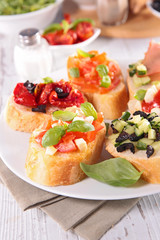 assorted bruschettas with ingredient