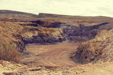 Dirt road in Makhtesh Ramon Crater in Negev desert, Israel
