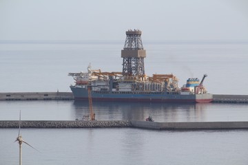 Oil drilling ship in a harbor at the atlantic coast