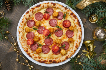 Christmas pizza on the wood board