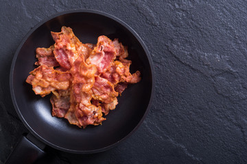 Pan with fried bacon