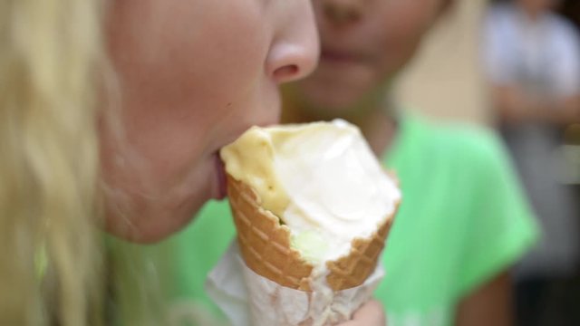 Three funny Girls eat fruity Plomber Ice cream Cone