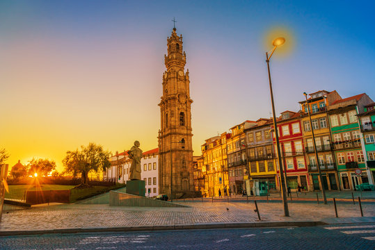 Beautiful sunset over famous Antonio Ferreira Bishop statue in front of garden Jardim de Cordoaria, known as Campo des Martires da Patria