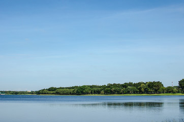 Obraz na płótnie Canvas Tree, lake and sky