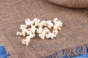 Popcorn on sacking background