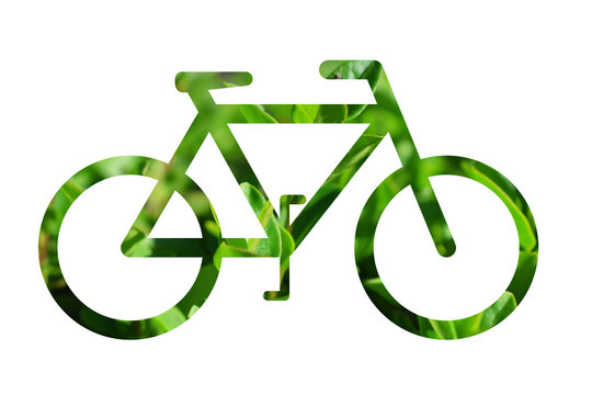 Bicicleta con fondo verde de hojas.