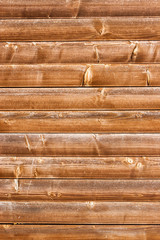 Horizontally tiled stained wood wall texture background