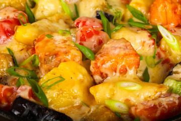Baked salmon with potato in pan