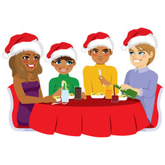 Happy diverse family eating together on Christmas eve