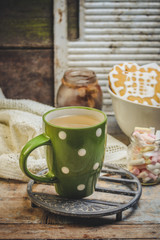 hot drink with cinnamon and marshmallows