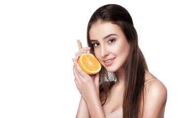 woman with orange on white background