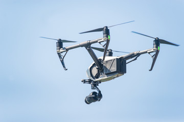 Fototapeta na wymiar Camera drone flying