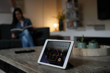 Closeup of digital tablet showing home control interface