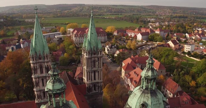 Aerial Drone moving backwards from cathedral Naumburg in Germany 4k Cityscape 