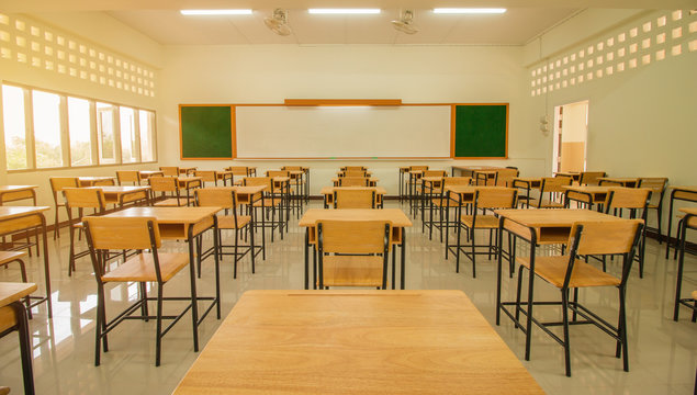 Lecture Room Or School Empty Classroom With Desks And Chair Iron Wood For Studying Lessons In High School Thailand, Interior Of Secondary Education, With Whiteboard, Vintage Tone Educational Concept