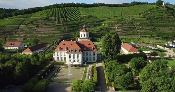 Aerial Drone moving backwards from castle schloss wackerbarth in Saxony Germany 4k