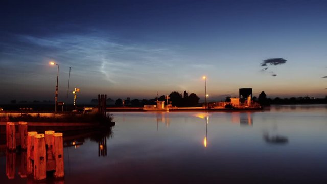 noctilucent clouds NLC over Noordhollandsch Kanaal canal summer twilight timelapse