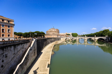 Fototapeta premium Attraction Saint Angel Castle and bridge Ponte Sant Angelo in Rome, Italy, Sunny summer day